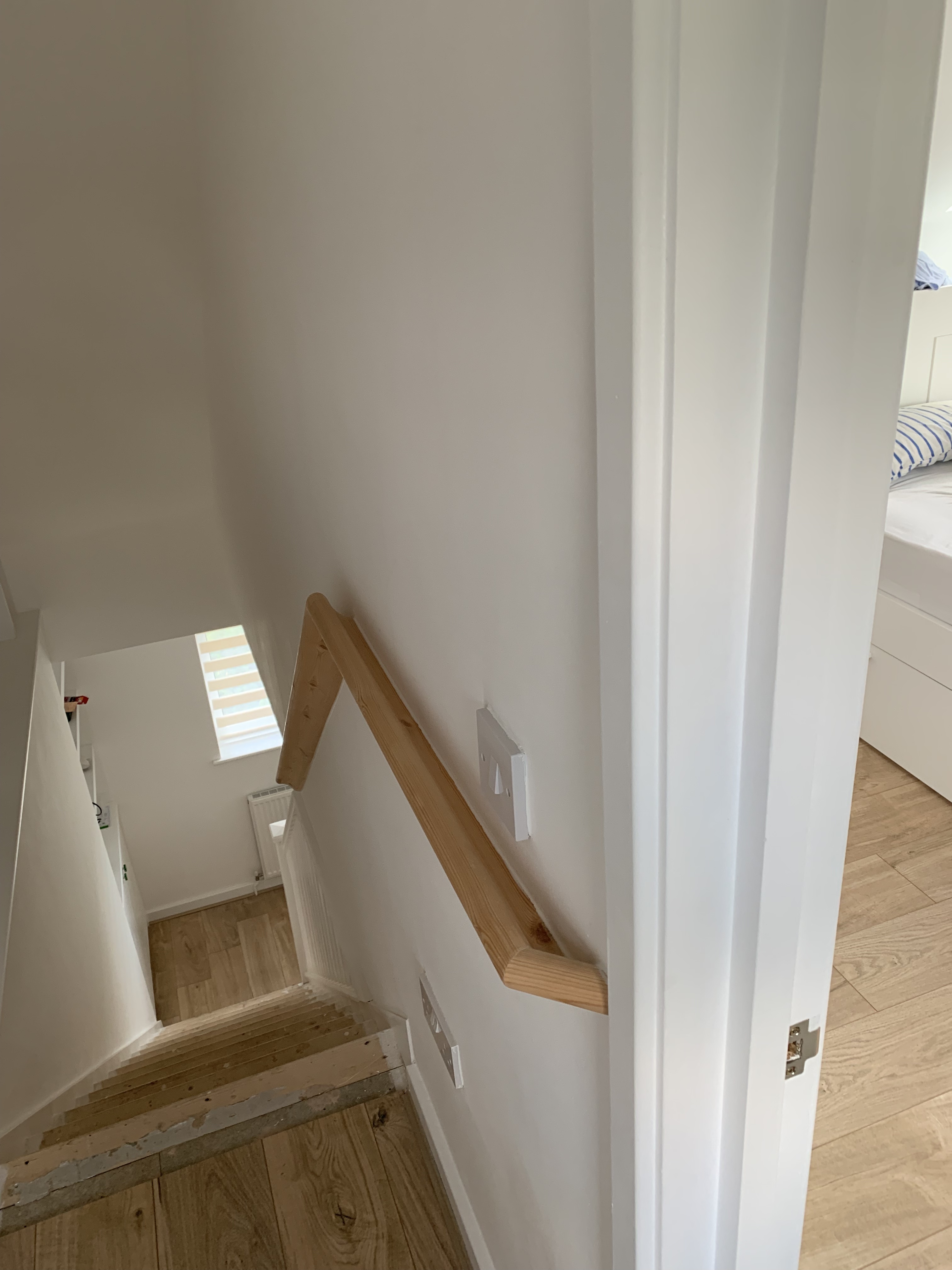 Finished loft conversion bedroom and staircase in Cambridge by Camacre