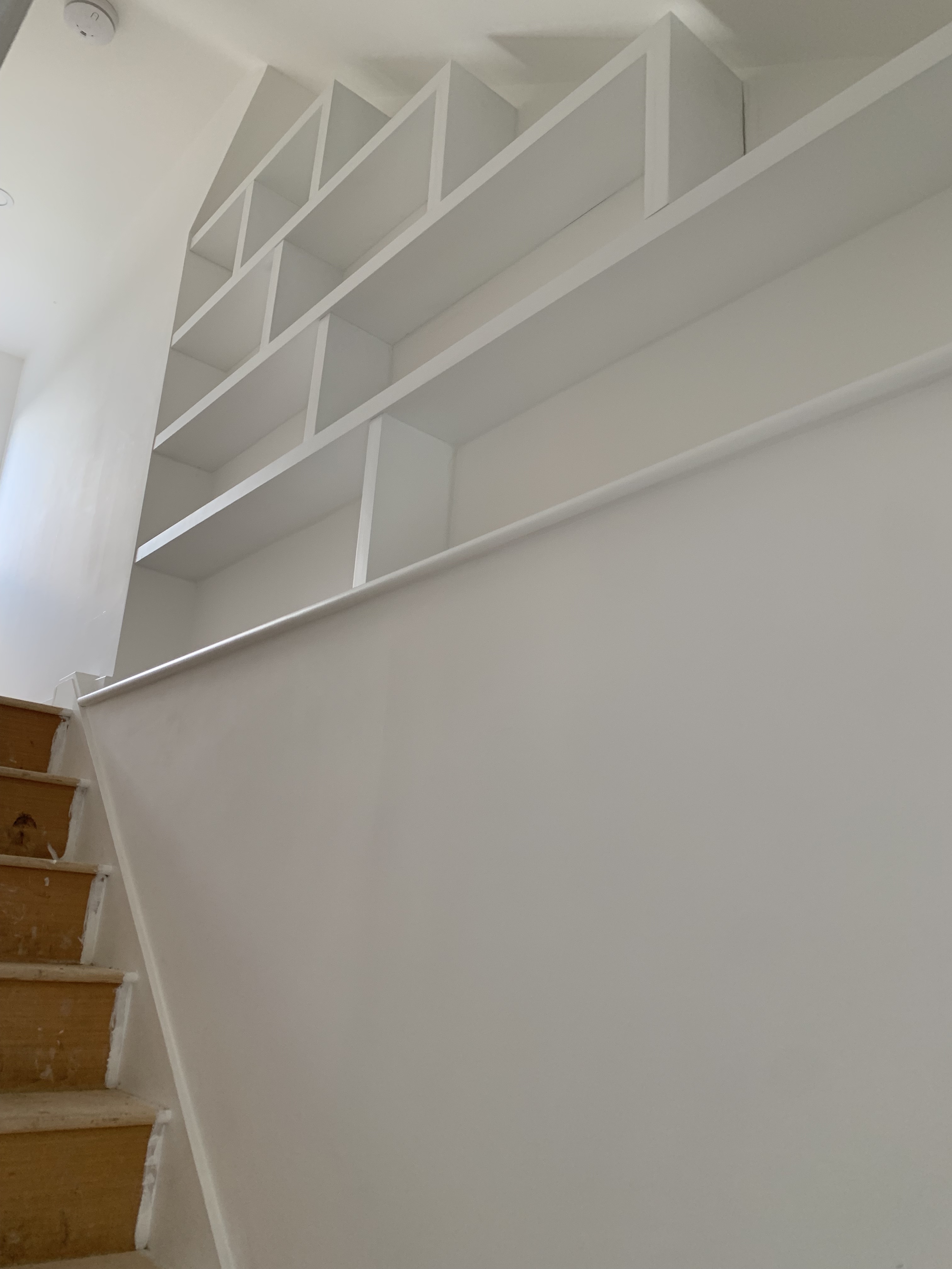 Finished loft conversion with eaves storage in Cambridge by Camacre